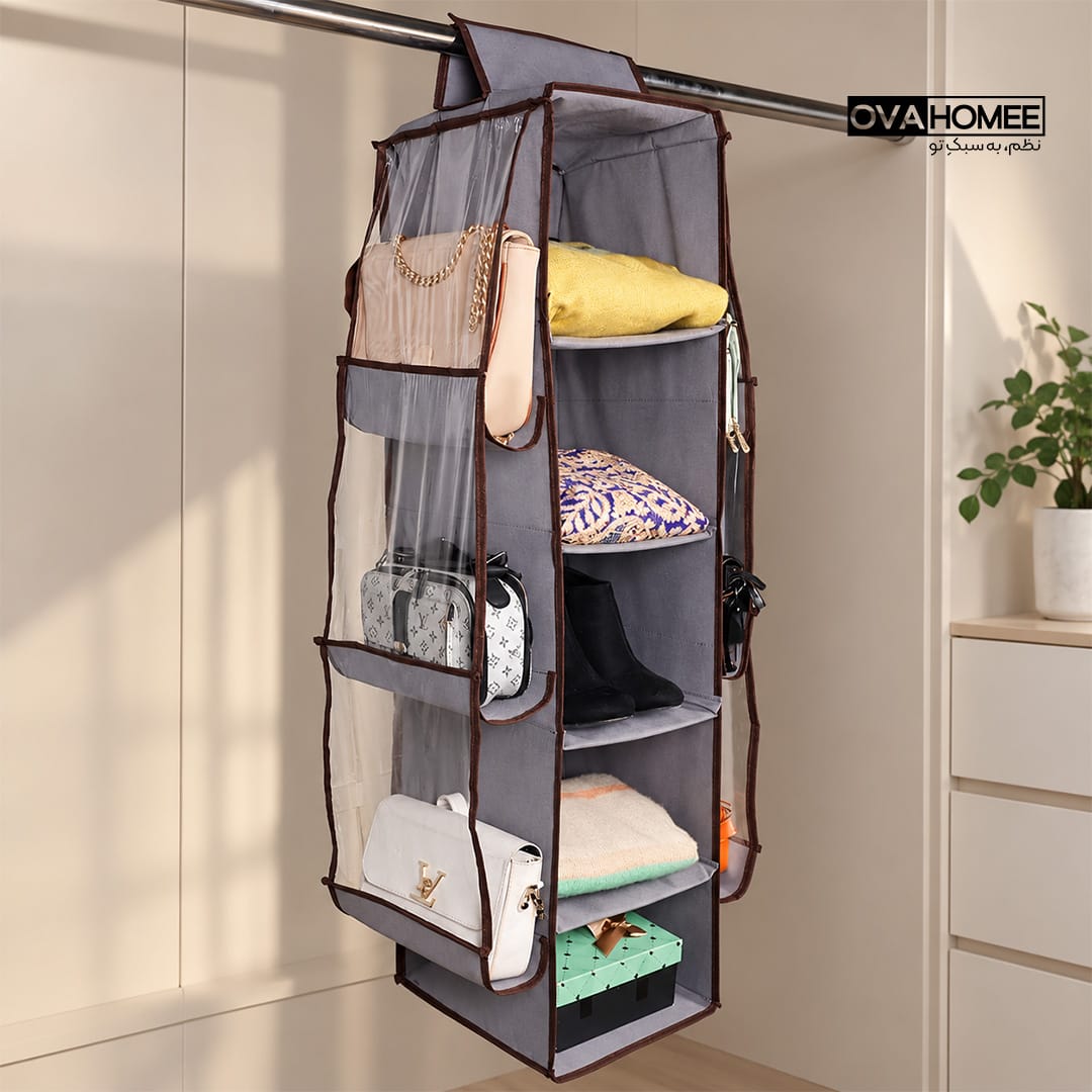 5-tier-hanging-closet-organizer-6-bag-pockets.webp نظمدهنده آویز داخل کمد با ۵ طبقه مرکزی و ۶ جیب جانبی برای کیف و کفش